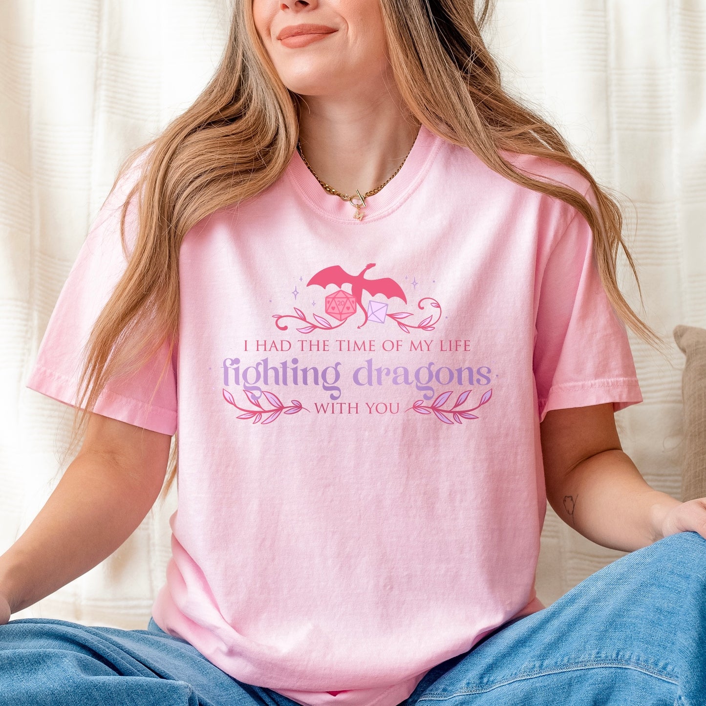 Woman wearing pink fantasy gamer tee, relaxed fit
